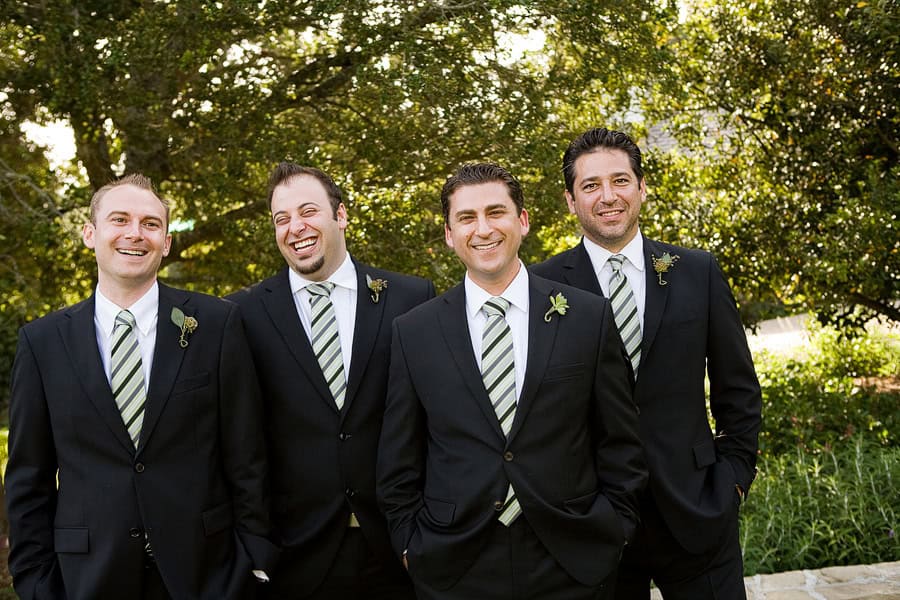 Brandon, the groom and his groomsmen laughing