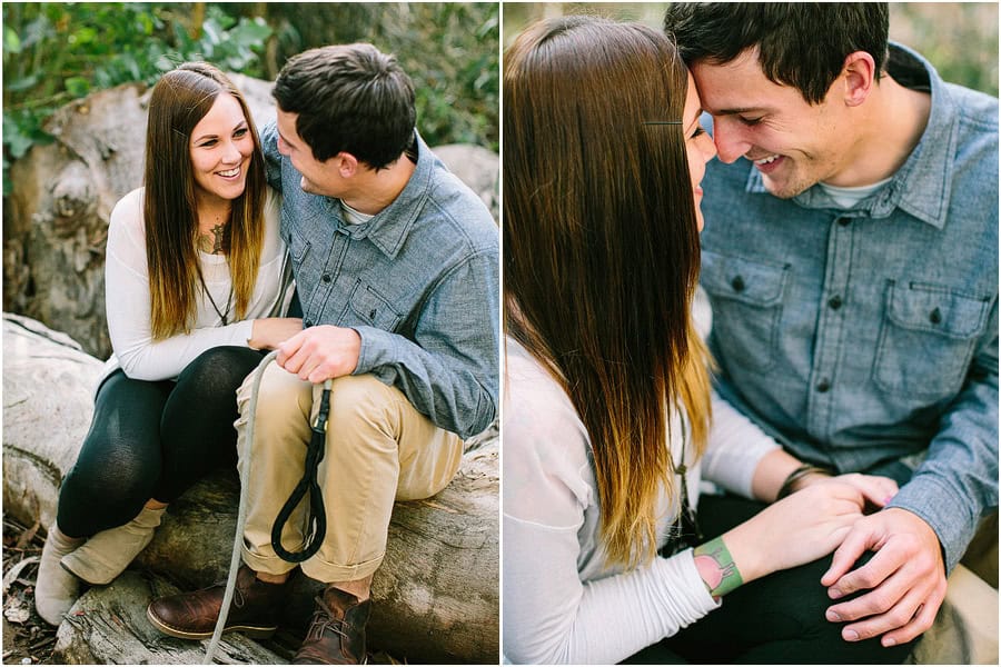An engaged couple sitting together.