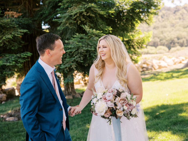 A joyful first look moment between the bride and groom at their Paso Robles wedding, as they see each other for the first time on their wedding day.