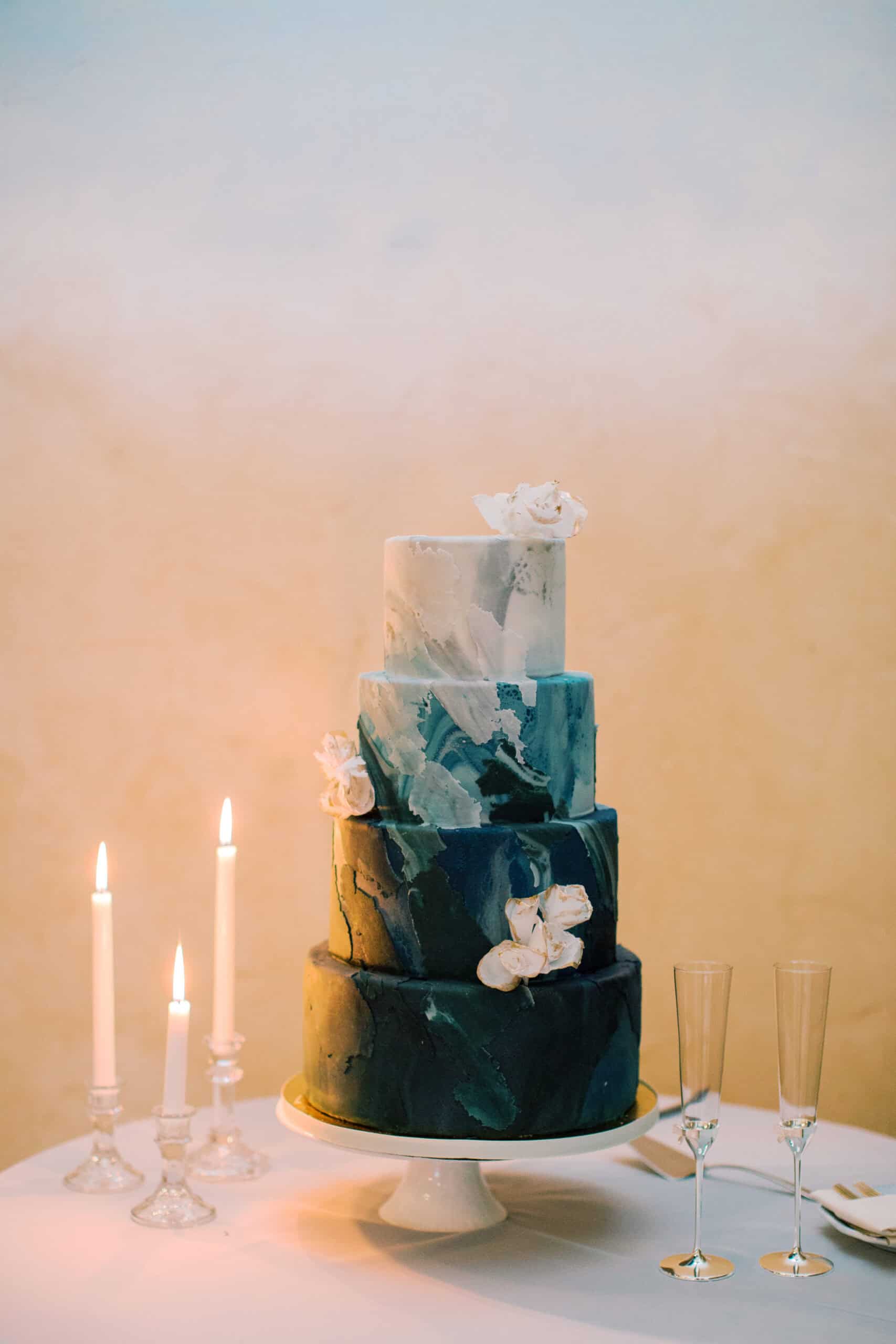 Watercolor-inspired blue wedding cake by Pretty Please SF for Laura and Matt's Pebble Beach wedding.