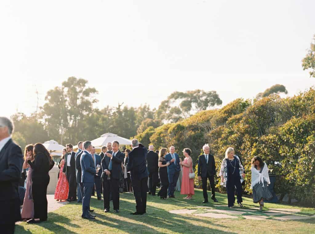 Guests enjoy cocktail hour on the upper lawn at the Ritz Carlton Bacara Resort in Santa Barbara. 